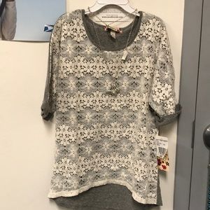 Girl top with butterfly necklace attached